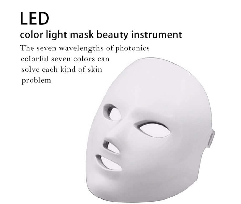Woman using Led Facial beauty instrument with pink LED lights for skincare rejuvenation and treatment.