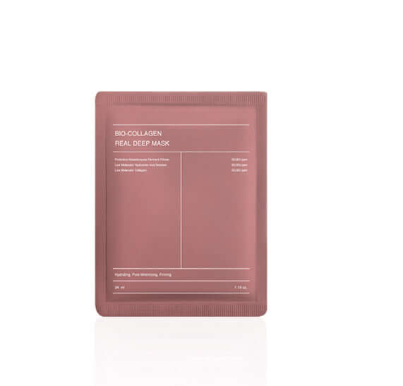 Woman applying Face Mask Shrink Pore Moisturizing for hydration and skin improvement.