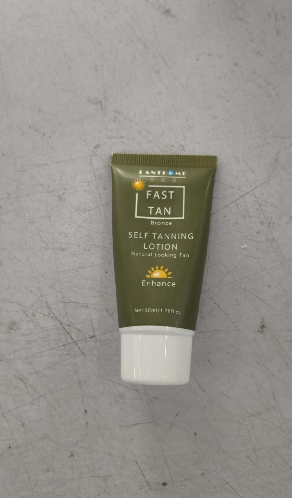 Tanning Cream Body Lotion in a tube, showing before and after results of self tanning on legs.